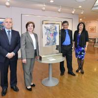 Miguel Betancourt (second from right), a visual artist from Ecuador, poses with (from left) Ecuadorean Ambassador Jaime Barberis and his wife, Maria, and Jacqueline Betancourt during the opening ceremony of an exhibition to mark the 100th anniversary of diplomatic relations between Ecuador and Japan at the Takanawa Civic Center Gallery on April 12. | YOSHIAKI MIURA