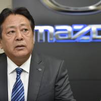 Mazda Motor Corp.\'s next president, Akira Marumoto, attends a news conference Friday in Hiroshima Prefecture. | KYODO