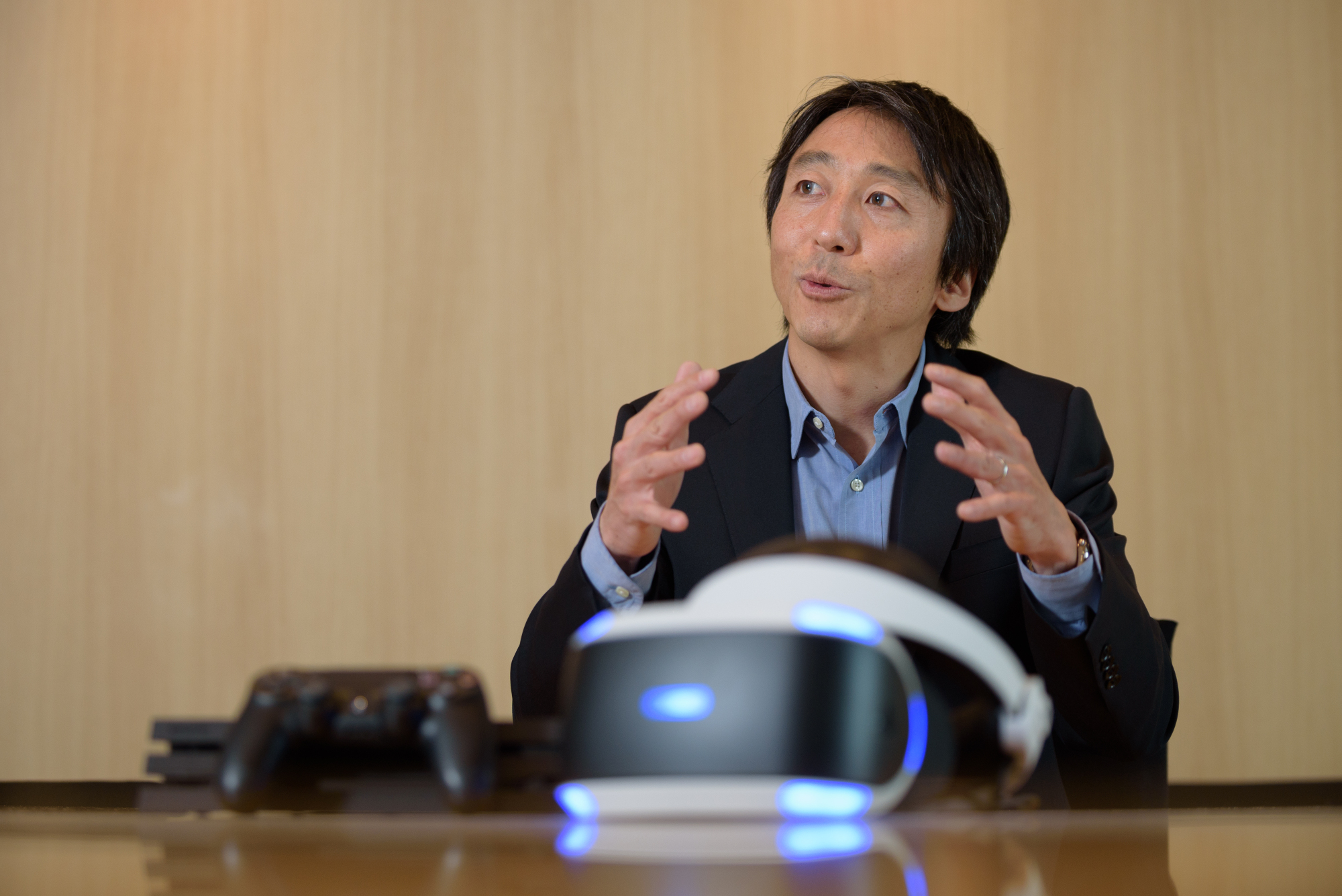 John Kodera, president and CEO of Sony Interactive Entertainment Inc., gestures during an interview in Tokyo on Wednesday. | BLOOMBERG