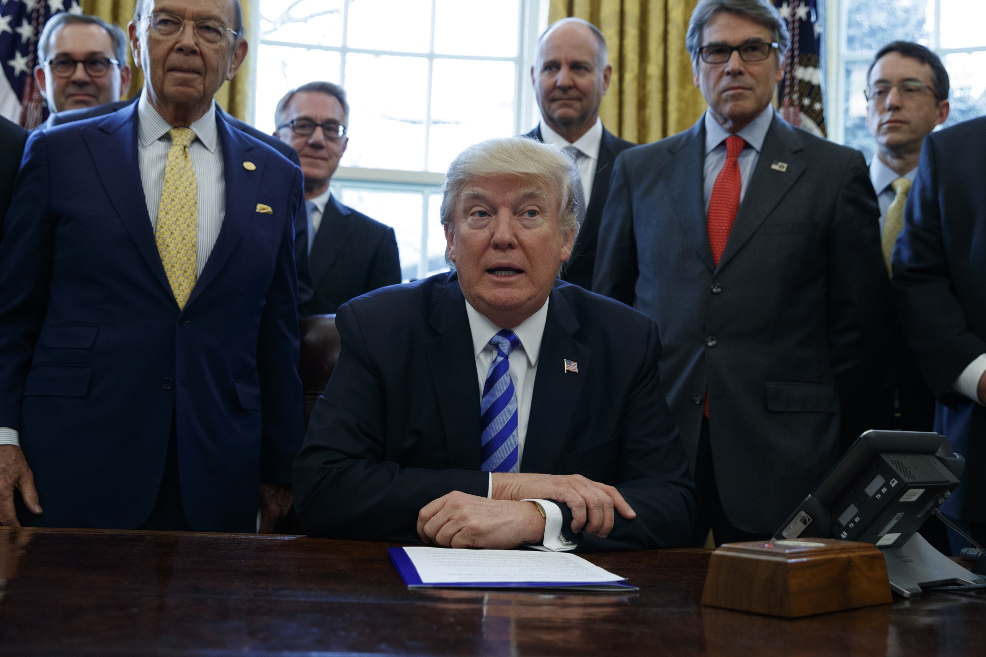 U.S. President Donald Trump has ordered his Commerce Department to consider launching a probe into whether vehicle imports threaten U.S. national security. | AP