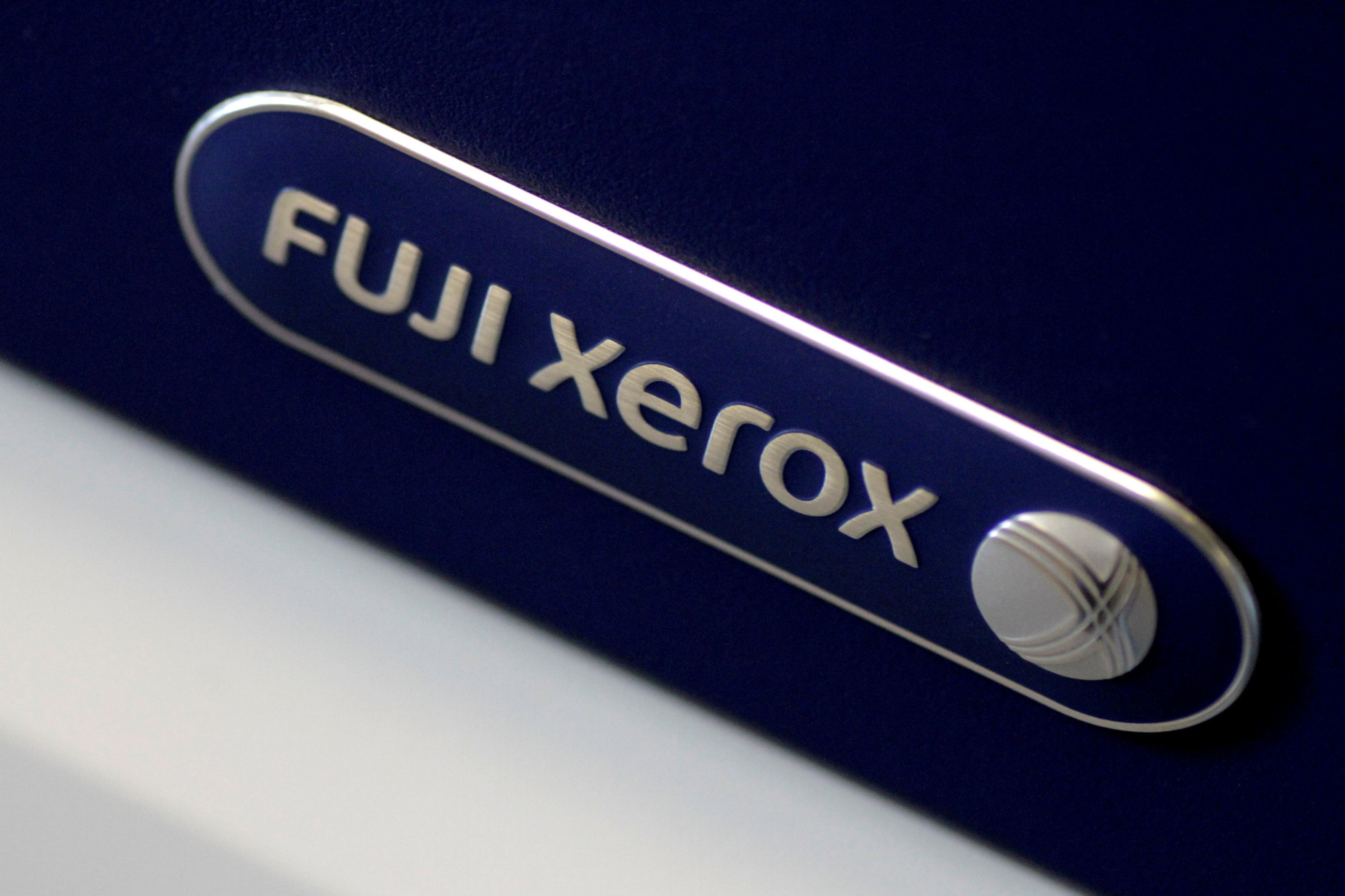 Xerox Corp.'s top executive and six board members agreed to step down amid the company's planned &#36;6.1 billion (&#165;670 billion) takeover by Fujifilm Holdings Corp. | REUTERS