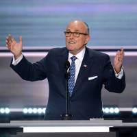 Former New York City Mayor Rudy Giuliani addresses delegates on the first day of the Republican National Convention in Cleveland in 2016. Giuliani, lawyer to President Donald Trump, says the investigation into Russian interference in the 2016 election and possible collusion with Trump\'s campaign will end by Sept. 1. | AFP-JIJI