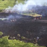 In this Sunday frame from video released by the U.S. Geological Survey, gases rise from a fissure near Pahoa, Hawaii. | U.S. GEOLOGICAL SURVEY / VIA AP