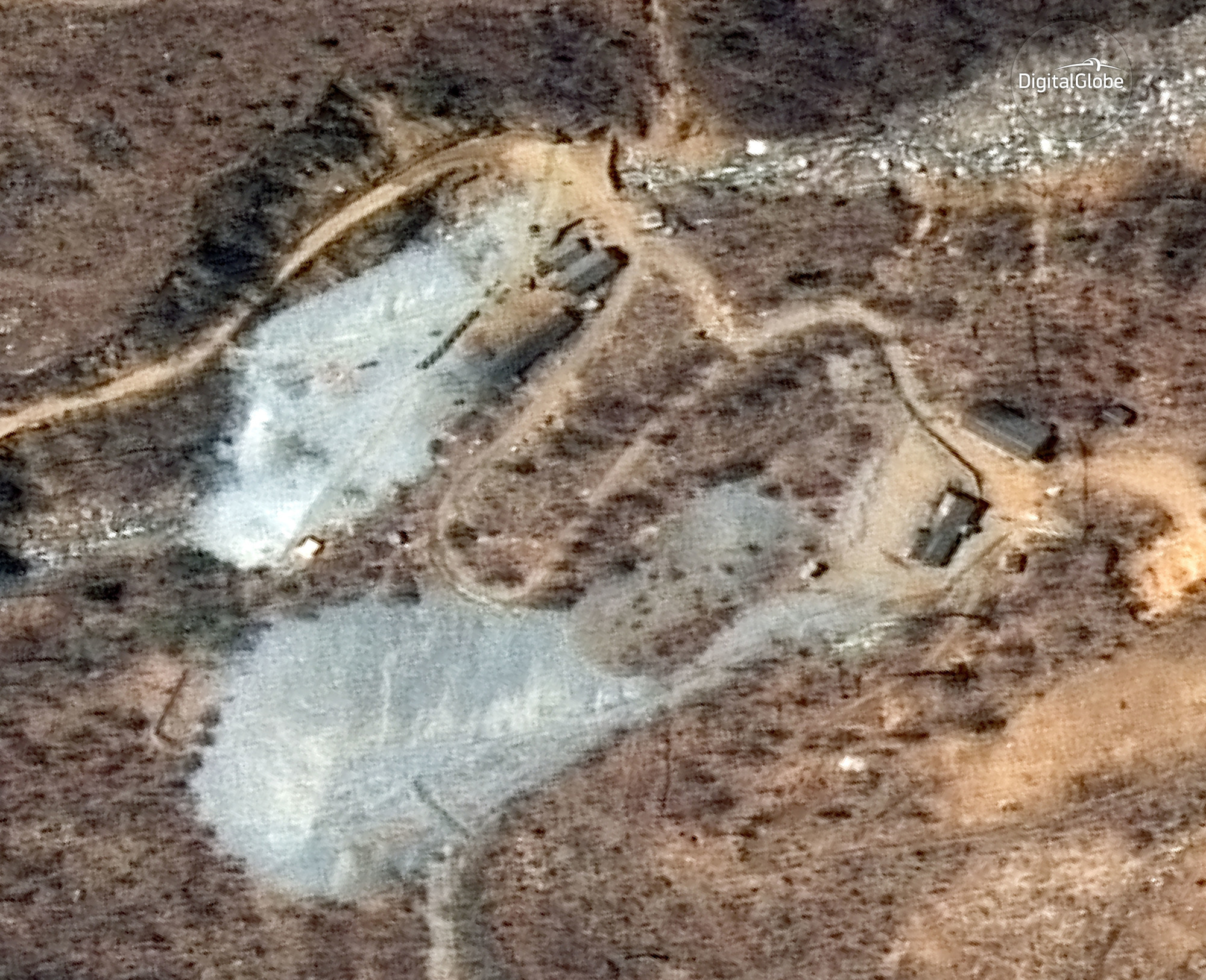 North Korea's Punggye-ri nuclear test site is seen in a satellite image taken April 20. | AP