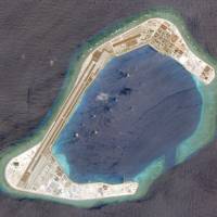 This satellite photo shows Subi Reef on March 20. | REUTERS