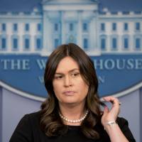 White House press secretary Sarah Huckabee Sanders listens to a question during the daily press briefing at the White House Tuesday in Washington. Sanders discussed Korea, media access at the EPA and other topics. | AP