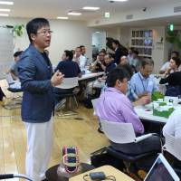 Tomoyoshi Noda gives a lecture at his Tokyo-based Institute for Strategic Leadership. | COURTESY OF TOMOYOSHI NODA