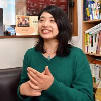 Sayaka Watanabe, founder and representative of the nonprofit organization Welgee, talks about the organization\'s home-stay and job-matching services for refugees, in Tokyo\'s Meguro Ward on April 17. | YOSHIAKI MIURA