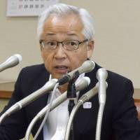 Komae Deputy Mayor Minoru Mizuno speaks at a news conference Monday at City Hall. | KYODO