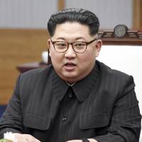 North Korean leader Kim Jong Un attends a meeting with South Korean President Moon Jae-in April. | KOREA SUMMIT PRESS POOL / VIA KYODO