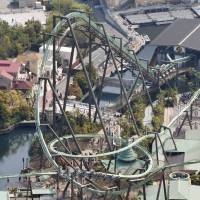 The Flying Dinosaur roller coaster at Universal Studios Japan in Osaka was temporarily halted Monday. | KYODO