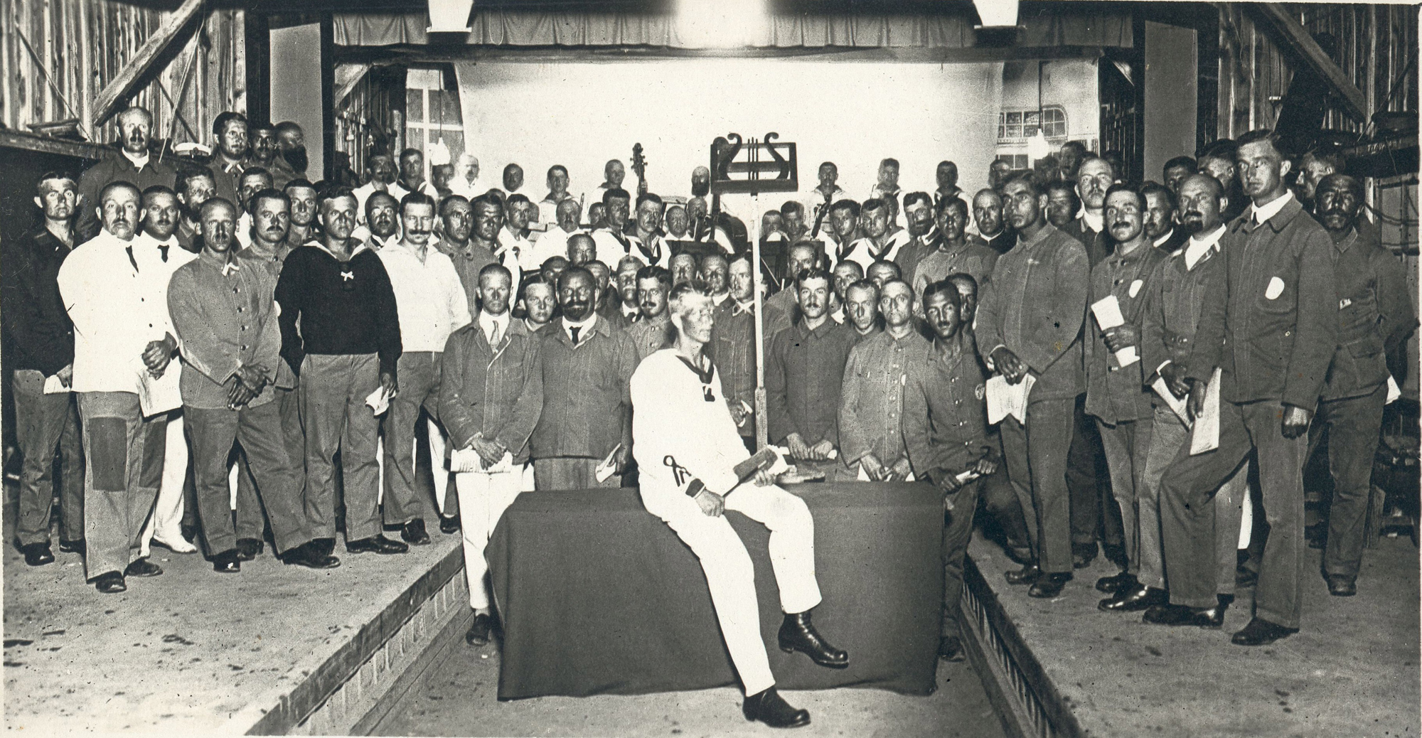 Profound performance: Prisoner of war Hermann Hansen (seated, center) conducted the Tokushima Orchestra and a choir made up of other POWs in a performance of Beethoven's Ninth Symphony that was held June 1, 1918, in Tokushima Prefecture. | NARUTO GERMAN HOUSE