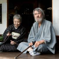 In the garden: Tsutomu Yamazaki (right) and Kirin Kiki play the real-life artist Morikazu Kumagai and his wife, Hideko, in the Shuichi Okita-directed biopic \"Mori, the Artist\'s Habitat.\" | &#169;︎ 2017 \"MORI, THE ARTIST\'S HABITAT\" FILM PARTNERS