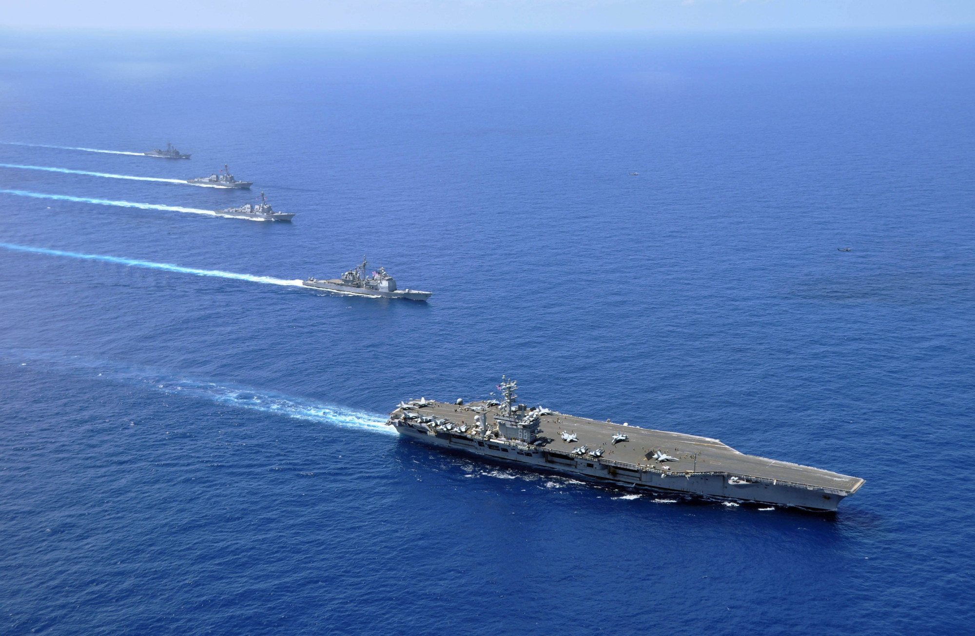 U.S. freedom of navigation operations in the South China Sea, such as this one conducted by the Nimitz carrier group in 2010, have done little to slow Beijing's efforts to boost its military presence in the disputed waters . | U.S. NAVY