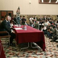 Nihon University defensive end Taisuke Miyagawa attends a news conference on Tuesday in Tokyo where he apologized for his role in a late hit against a Kwansei Gakuin University quarterback in an exhibition game on May 6. | AFP-JIJI