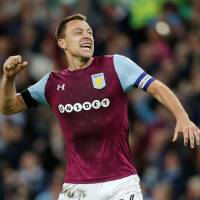 Aston Villa captain John Terry celebrates after his team\'s Championship playoff semifinal aggregate victory over Middlesbrough on Tuesday. | REUTERS