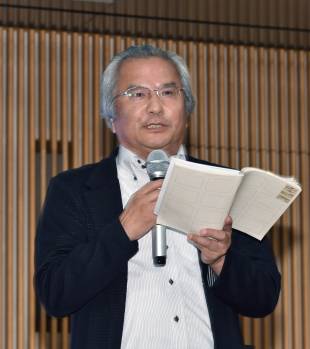 Masataka Ota, chief consultant at JTB Tourism Research & Consulting Co. who serves as a vice-chairman of the Japan Times Satoyama Consortium management committee, addresses the audience at the symposium