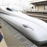 A new shinkansen model, the N700S, pulls out of Mikawa-Anjo Station in Aichi Prefecture on a test run to Shin-Osaka Station. | KYODO