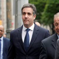 U.S. President Donald Trump\'s personal lawyer, Michael Cohen (center), arrives at federal court in Manhattan, New York, May 30. | REUTERS