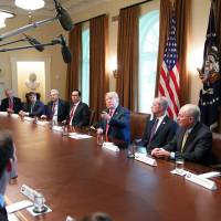 U.S. President Donald Trump meets with Cabinet members and Republican members of Congress in the Cabinet Room of the White House on Wednesday. | AFP-JIJI