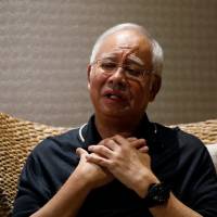 Former Prime Minister Najib Razak speaks during an interview in Langkawi, Malaysia, on Tuesday. | REUTERS