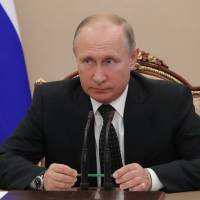 Vladimir Putin | SPUTNIK / VIA AFP-JIJI