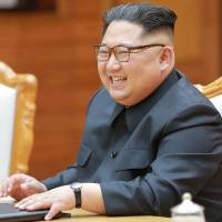 North Korean leader Kim Jong Un smiles during his second summit with South Korean President Moon Jae-in at the north side of  Panmunjom truce village, in the Demilitarized Zone between the two Koreas, on May 26. | AFP-JIJI
