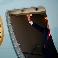 U.S. President Donald Trump arrives in Dallas on Thursday. | REUTERS