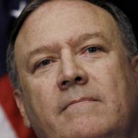 Mike Pompeo, U.S. secretary of state, listens during a press conference after meeting with North Korea\'s Kim Yong Chol, not pictured, in New York on Thursday. Pompeo said the U.S. and North Korea made \"real progress\" during talks in New York over the conditions for a summit between President Donald Trump and Kim Jong Un, but declined to say if the two sides bridged key differences over issues such as denuclearization. | BLOOMBERG