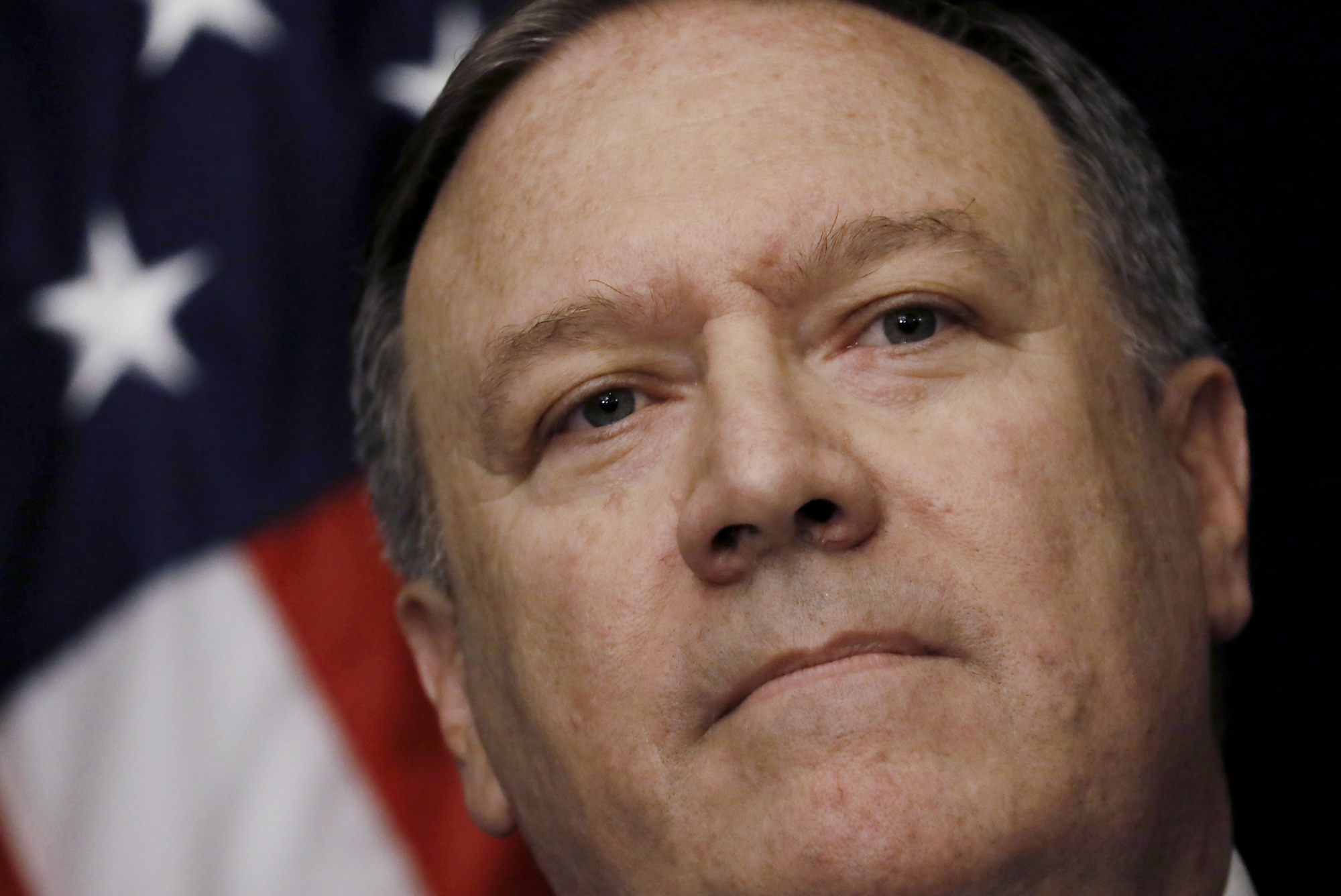 Mike Pompeo, U.S. secretary of state, listens during a press conference after meeting with North Korea's Kim Yong Chol, not pictured, in New York on Thursday. Pompeo said the U.S. and North Korea made 'real progress' during talks in New York over the conditions for a summit between President Donald Trump and Kim Jong Un, but declined to say if the two sides bridged key differences over issues such as denuclearization. | BLOOMBERG