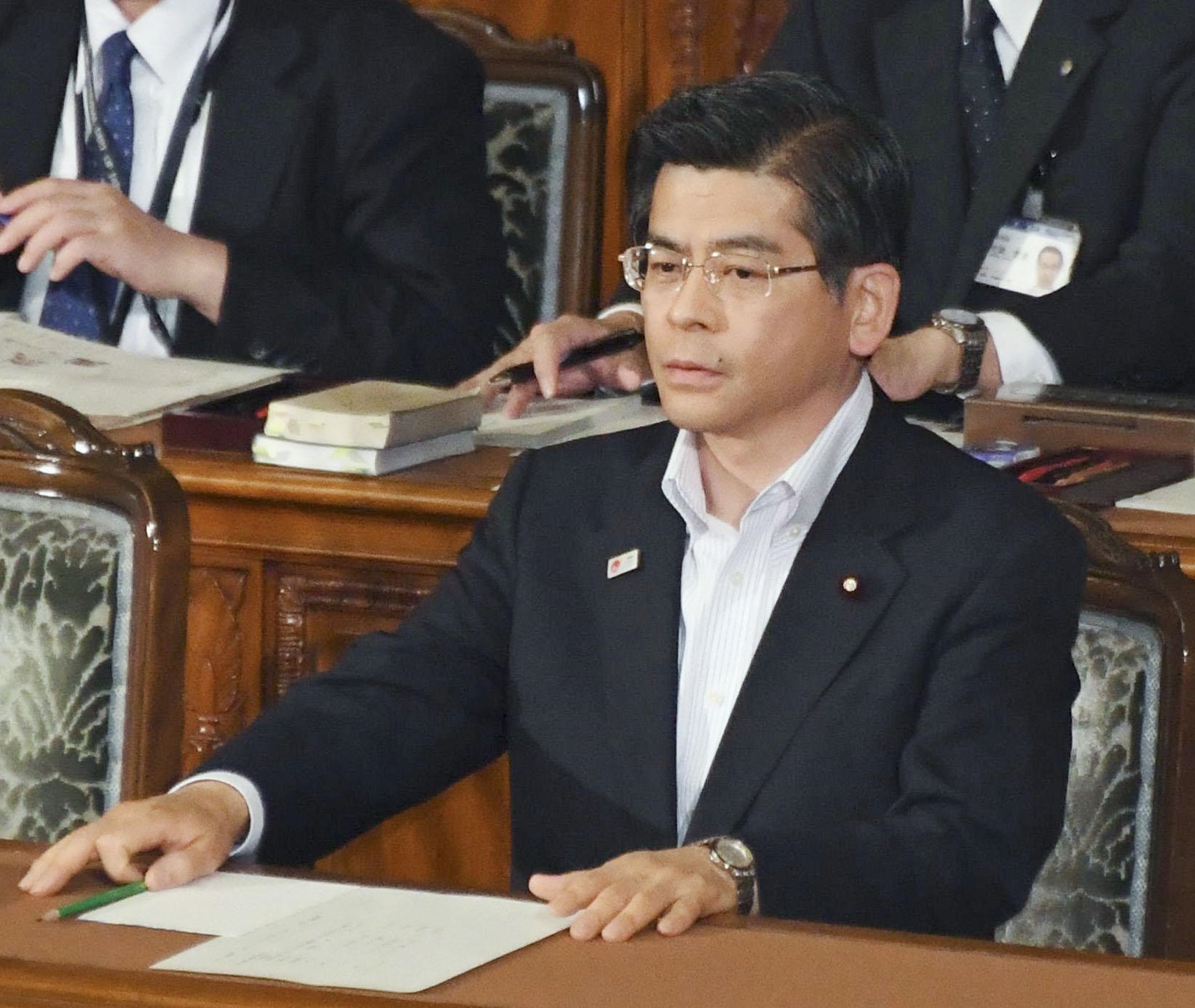 Land, Infrastructure, Transport and Tourism Minister Keiichi Ishii Friday attends a Lower House session where a no-confidence motion against him, submitted by opposition parties, was voted down. | KYODO