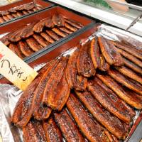 According to Greenpeace Japan, at least 2.7 tons of cooked eel was thrown away by retailers last year after the traditional summer promotion campaign. | KYODO
