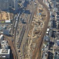 The site for a new station on Tokyo\'s Yamanote Line is seen in this aerial photo taken in March last year. East Japan Railway Co. is asking the public to name the station, which is to be opened in the spring of 2020. | KYODO