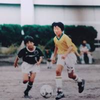 Starting out on the right foot: Yuki Nagasato (right) playing soccer at around age 10. | YUKI NAGASATO