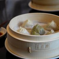 Three kinds of xiao long bao: regular, crab and green tea with oolong at Jin Din Rou. | THOMAS BEECHER