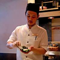 Let the fight begin: A chef at Nori-Temaki prepares a nori paste temaki roll. | ROBBIE SWINNERTON