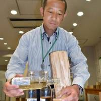 Barking up the right tree: Researchers in Tsukuba have developed a new way to make drinkable alcohol from wood. | KYODO