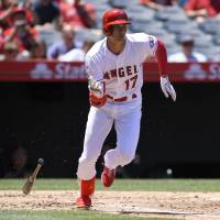 Los Angeles Angels star Shohei Ohtani will be out of action for three weeks due to an elbow injury, the team announced on Friday. | AP