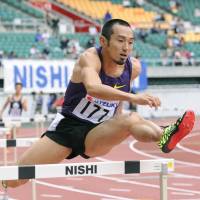 Dai Tamesue, seen competing at a track meet in May 2011 in Shizuoka Prefecture, made a name for himself as a world-class hurdler before retiring in 2012. | KYODO