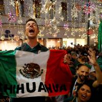 Mexico\'s fans celebrate the victory of their team after the 1-0 match with Germany. | REUTERS