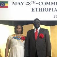 Ethiopian Ambassador Cham Ugala Uriat (right) and his wife, Haimanot Zerihun, pose during a reception to celebrate Ethiopia\'s national day at Hotel Okura Tokyo on May 22. | HIROKO INOUE