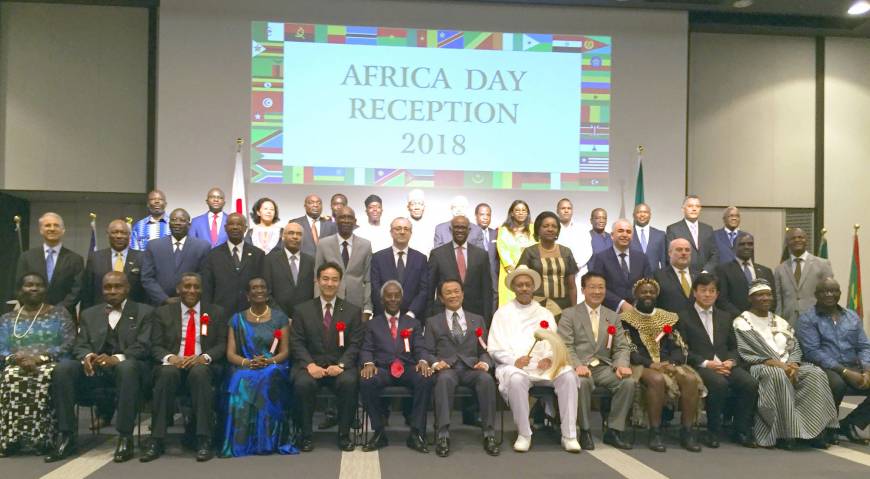 Deputy Prime Minister Taro Aso (front center) poses for a photo with Eritrean Ambassador Afeworki Haile Estifanos (sixth from right) and other African ambassadors at a reception to celebrate Africa Day in Tokyo