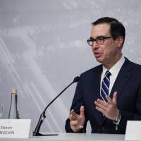 Steven Mnuchin, U.S. Treasury secretary, speaks at a news conference during the G20 finance ministers and central bankers meetings in Buenos Aires on Sunday. Mnuchin said that there is no chance of a currency war erupting despite U.S. President Donald Trump\'s tweets. | BLOOMBERG
