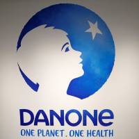 The logo of French food group Danone is pictured during the company\'s 2017 annual results in Paris in February. | REUTERS