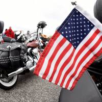 A U.S. flag is pictured in front of Harley-Davidson bikes at the \"Hamburg Harley Days\" in Hamburg, Germany, June 24. | REUTERS