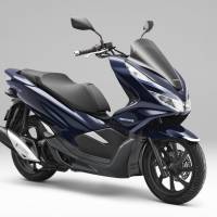Honda Motor Co. says it will launch the PCX Hybrid scooter in Thailand in August. | KYODO