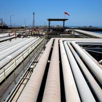 An oil tanker is being loaded at Saudi Aramco\'s Ras Tanura oil refinery and oil terminal in Saudi Arabia May 21. | REUTERS