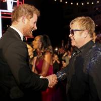Britain\'s Prince Harry (left) greets Elton John after the Royal Variety Performance at the Albert Hall in London in 2015. | REUTERS