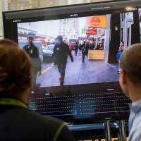 A display shows a facial recognition system for law enforcement during the NVIDIA GPU Technology Conference, which showcases artificial intelligence, deep learning, virtual reality and autonomous machines, in Washington last November. | AFP-JIJI
