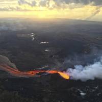 Kilauea\'s lower East Rift Zone in Hawaii is seen at sunrise on Tuesday. | U.S. GEOLOGICAL SURVEY / VIA AP